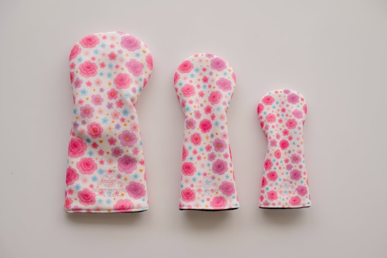 Snuggle Bug Golf Starlight Bloom 3-piece golf headcover set with pink and purple floral celestial pattern