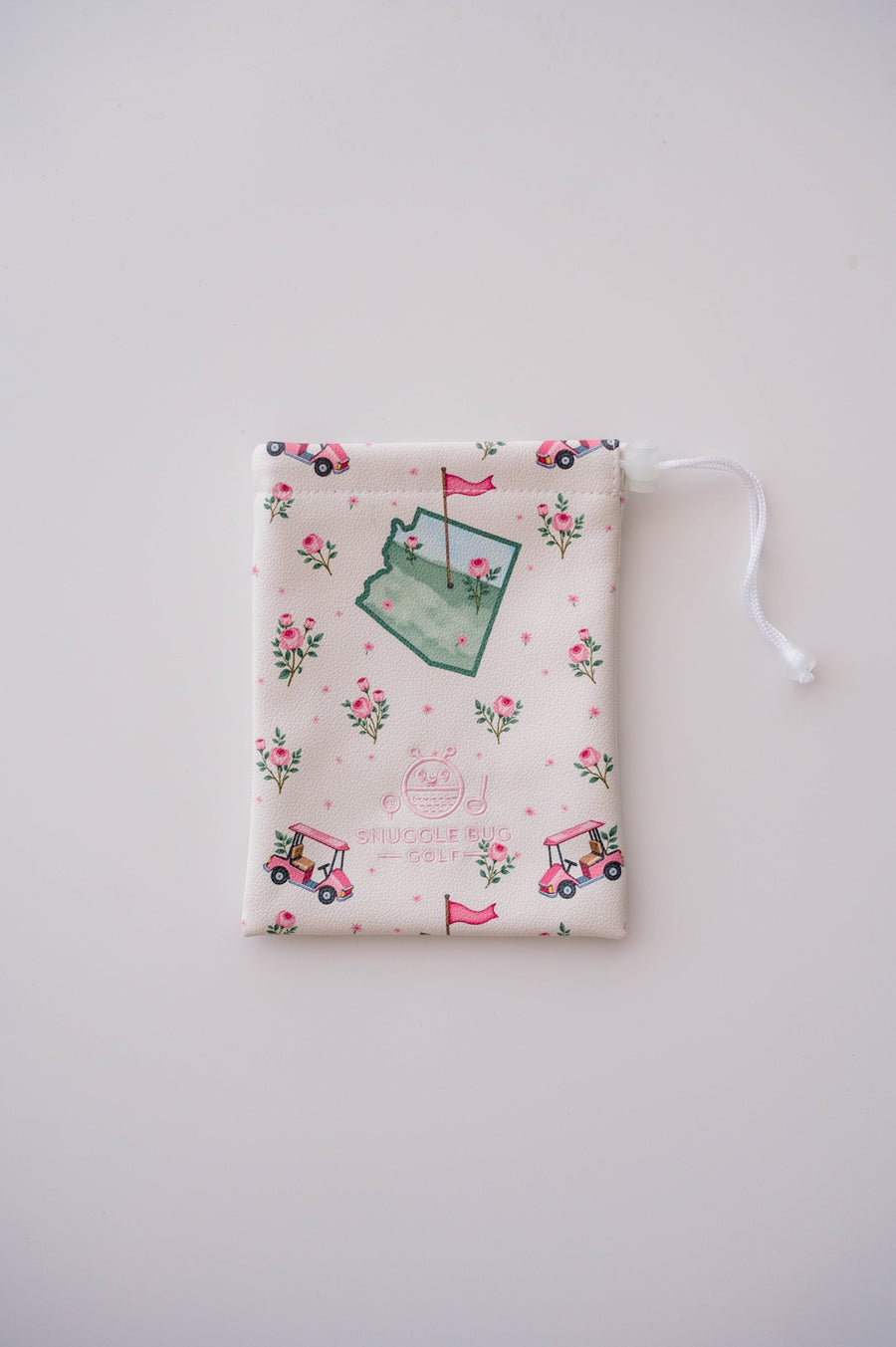 Snuggle Bug Golf Arizona Bloom drawstring pouch in cream eco-leather with cactus, golf cart, and rose print.