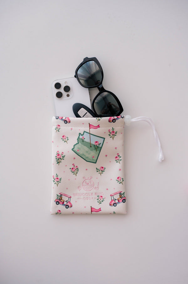 Snuggle Bug Golf Arizona Bloom drawstring pouch in cream eco-leather with pink golf cart and floral print.