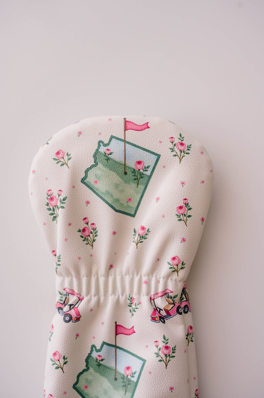 Snuggle Bug Golf Arizona Bloom driver headcover in cream eco-leather with pink roses and golf cart print.