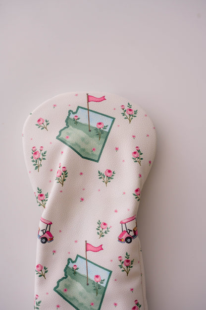 Snuggle Bug Golf Arizona Bloom driver headcover in cream eco-leather with pink golf carts and rose floral print.