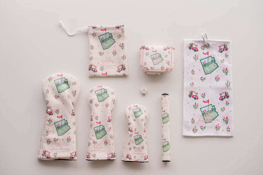 Snuggle Bug Golf Arizona Bloom collection featuring golf headcovers, towel, and accessories with desert floral print.