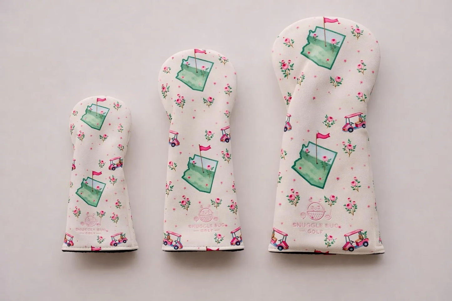 Snuggle Bug Golf Arizona Bloom floral golf club headcover set with desert map and golf cart print on cream fabric.