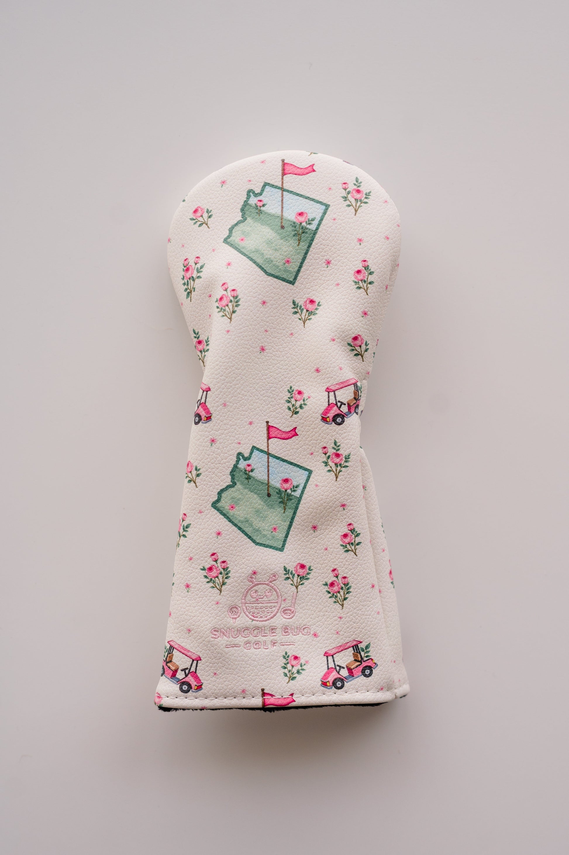 Snuggle Bug Golf Arizona Bloom hybrid headcover in cream eco-leather with pink desert rose and golf cart print.