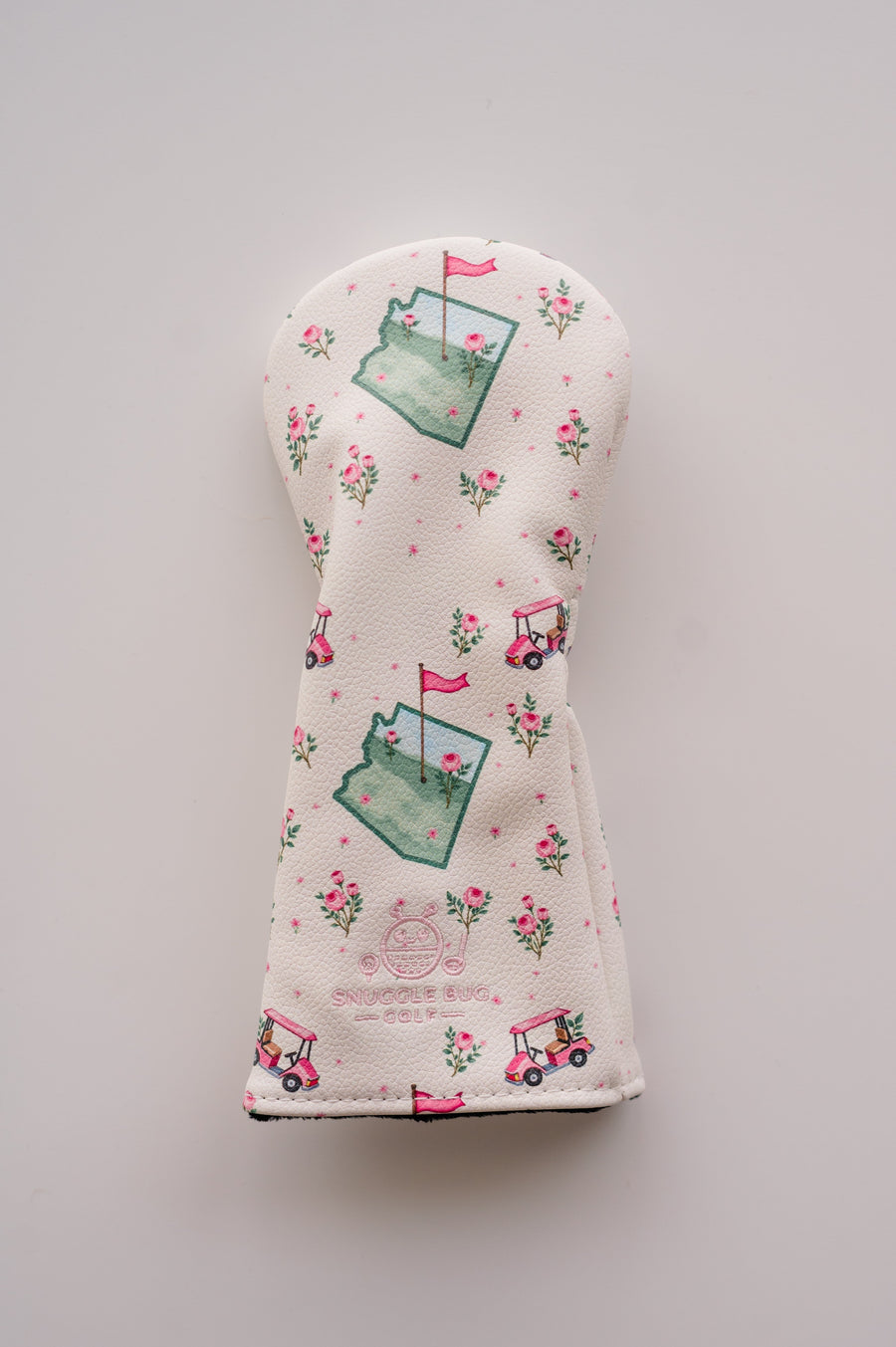 Snuggle Bug Golf Arizona Bloom hybrid headcover in cream eco-leather with pink desert rose and golf cart print.