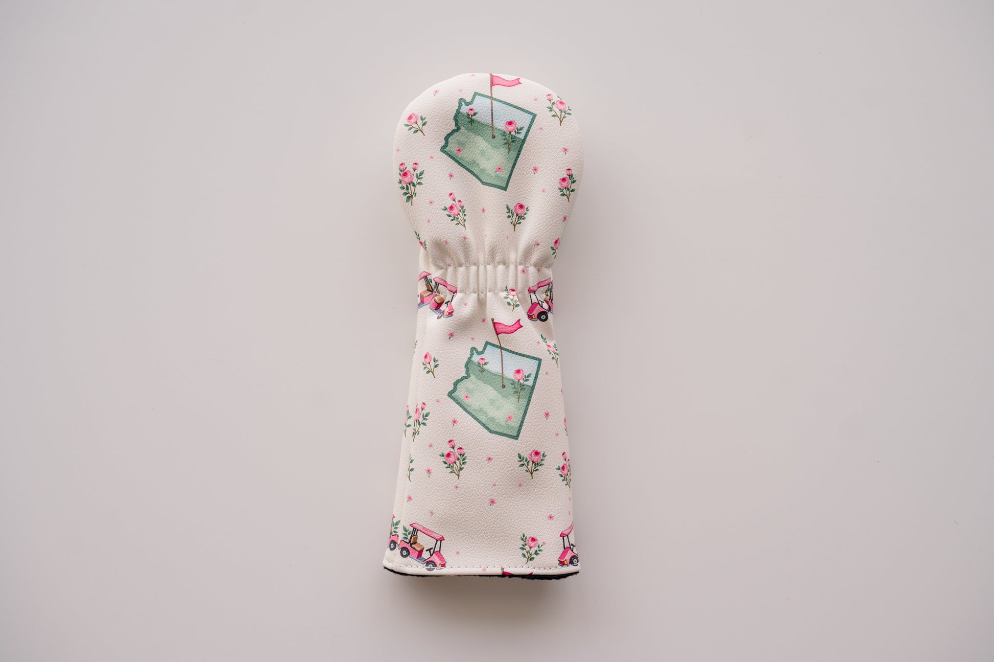 Snuggle Bug Golf Arizona Bloom hybrid headcover in cream eco-leather with a Southwest floral and golf cart print.