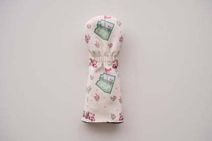 Snuggle Bug Golf Arizona Bloom hybrid headcover in cream eco-leather with a Southwest floral and golf cart print.