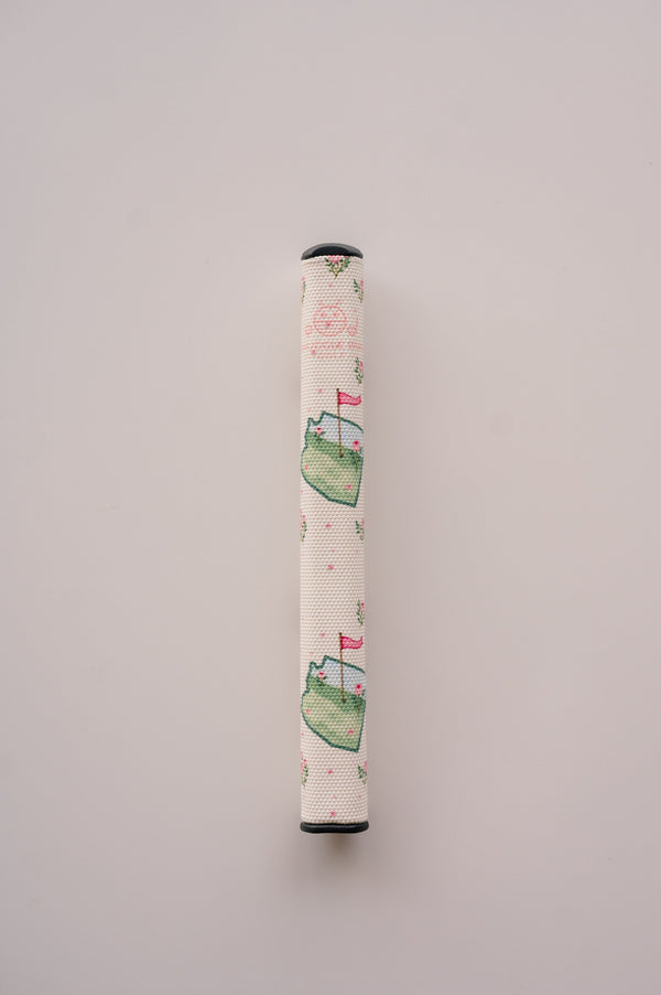 Snuggle Bug Golf Arizona Bloom putter grip featuring a floral print with pink blossoms and green golf course motifs.