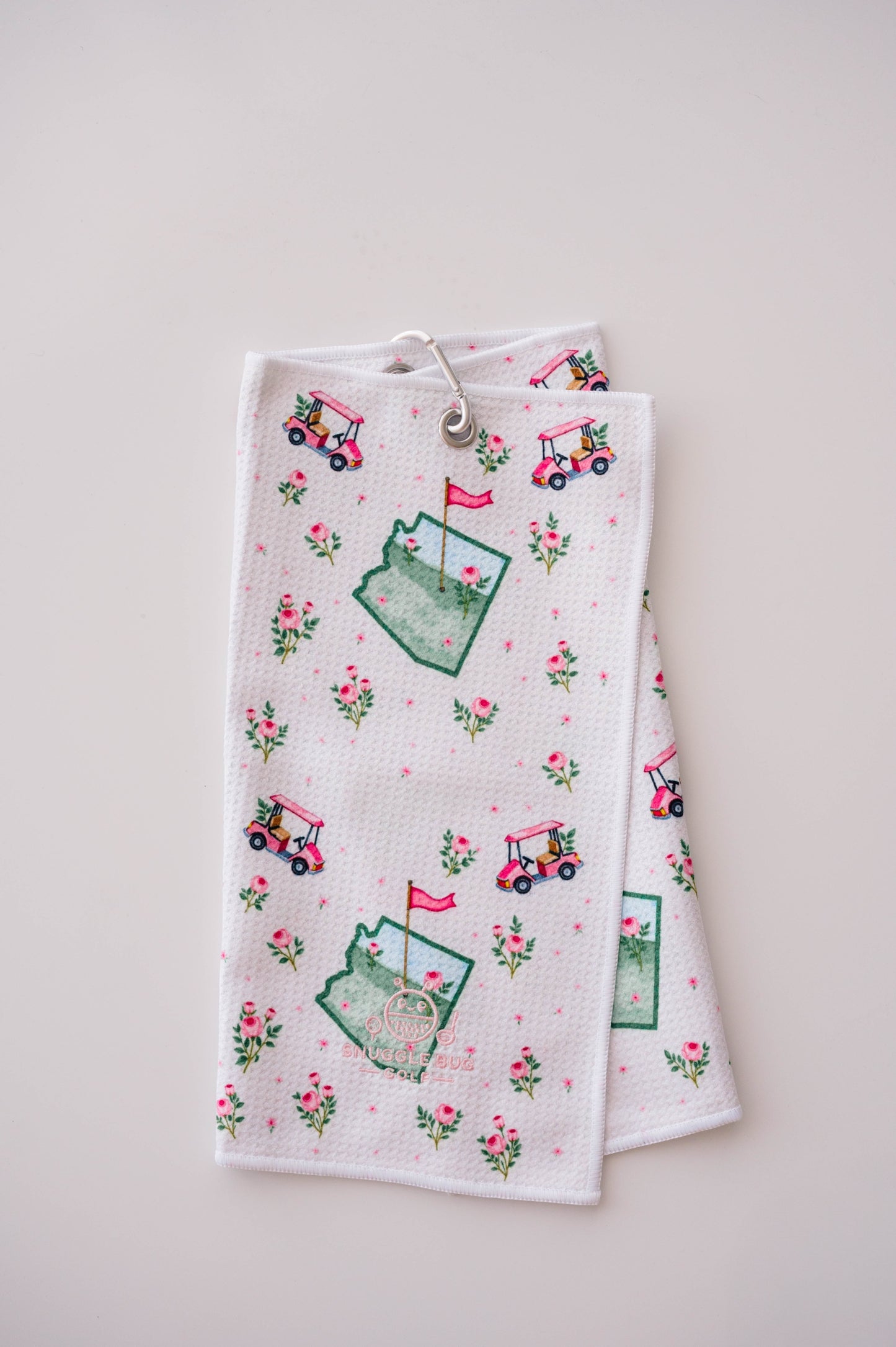 Snuggle Bug Golf Arizona Bloom waffle microfiber towel with pink roses, golf carts, and desert blush pattern.