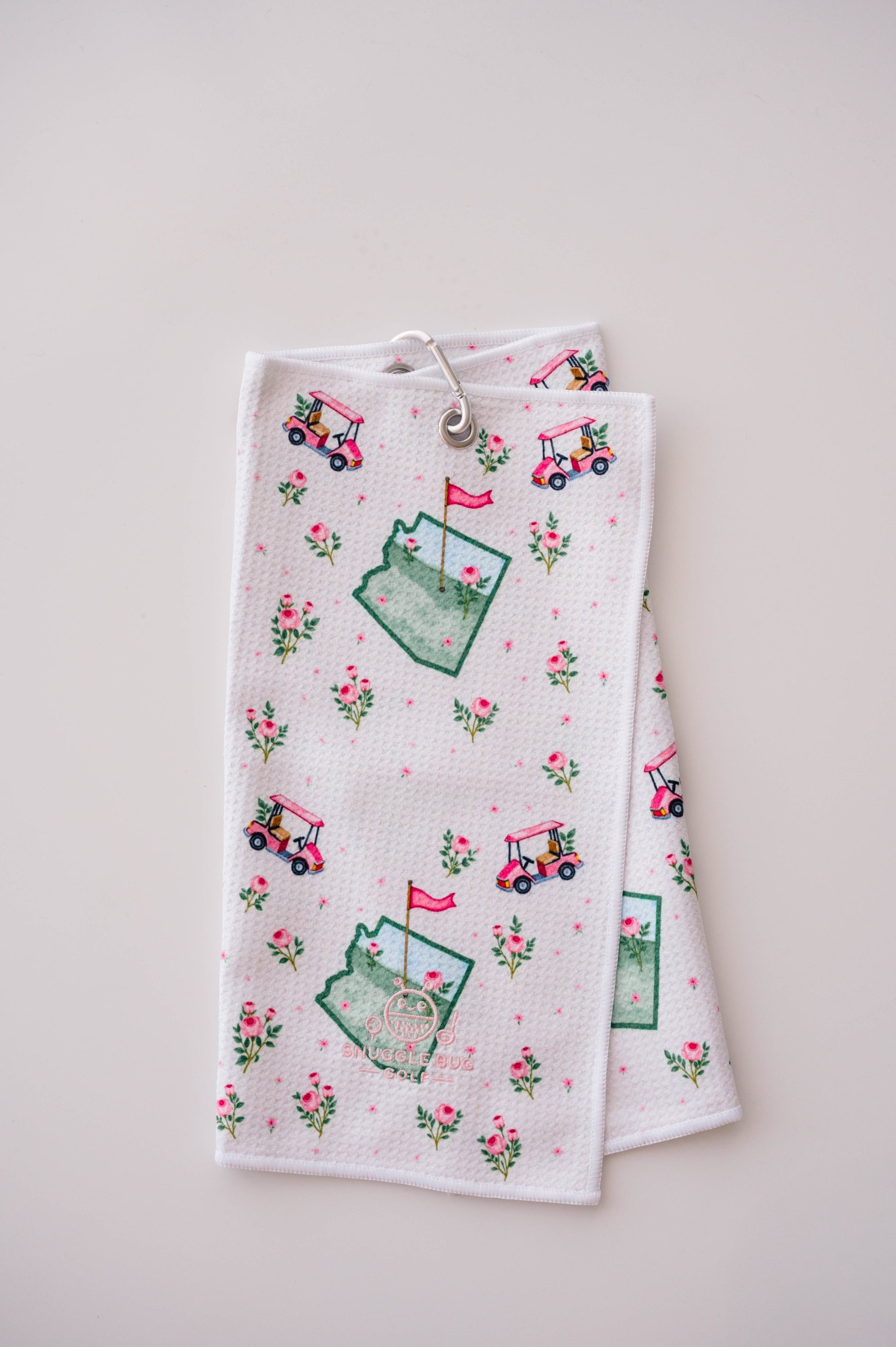 Snuggle Bug Golf Arizona Bloom waffle microfiber towel with pink roses, golf carts, and desert blush pattern.