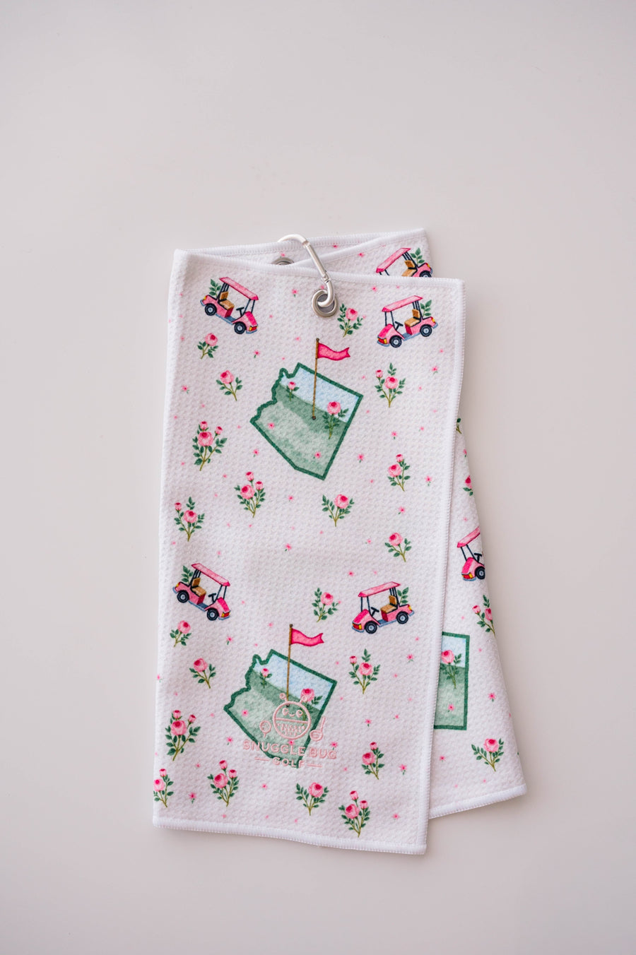 Snuggle Bug Golf Arizona Bloom waffle microfiber towel with pink roses, golf carts, and desert blush pattern.