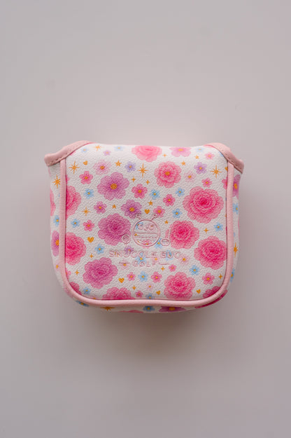 Snuggle Bug Golf mallet putter headcover in white textured eco-leather with pink floral, star, and heart pattern.