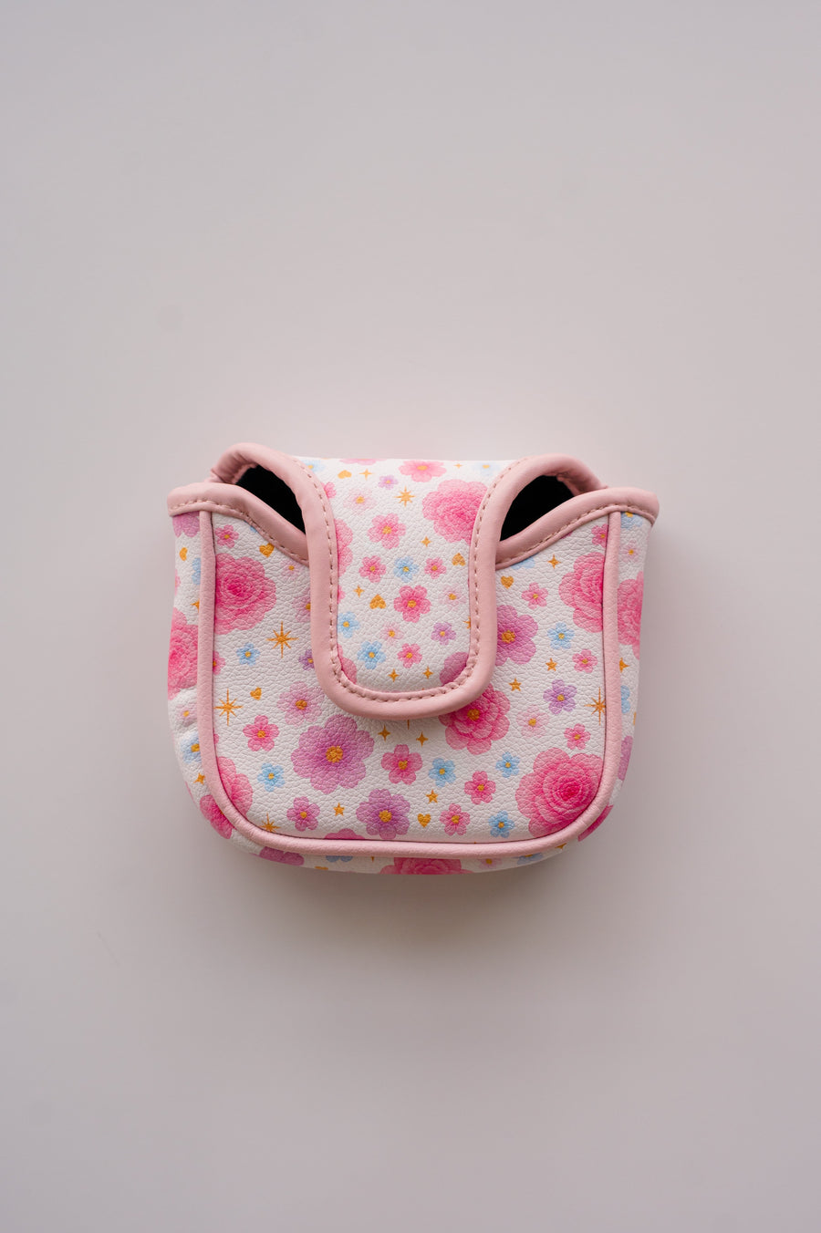Snuggle Bug Golf mallet putter headcover in white eco-leather with a pastel floral, star, and heart print.
