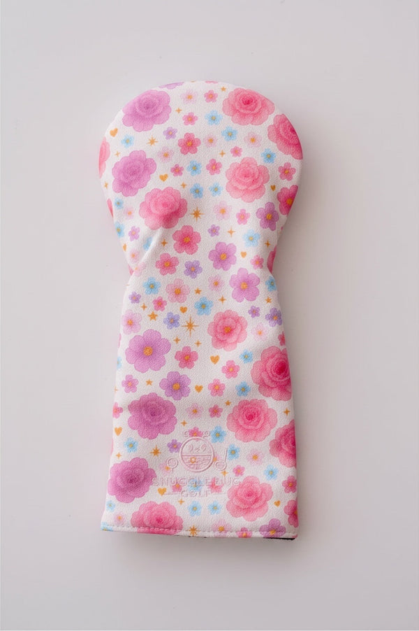 Snuggle Bug Golf Starlight Bloom driver head cover in white eco-leather with pink floral and golden star pattern.