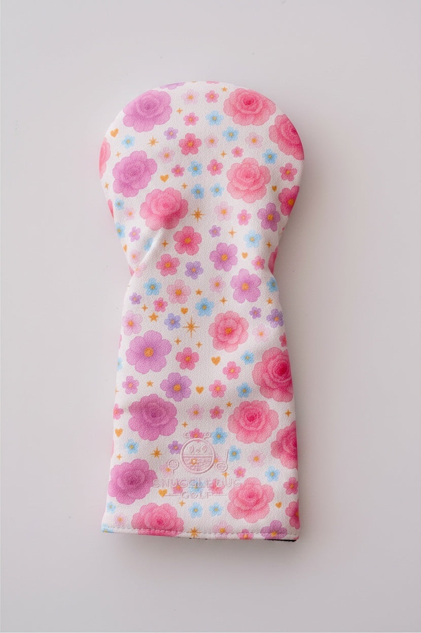 Snuggle Bug Golf Starlight Bloom driver head cover in white eco-leather with pink floral and golden star pattern.