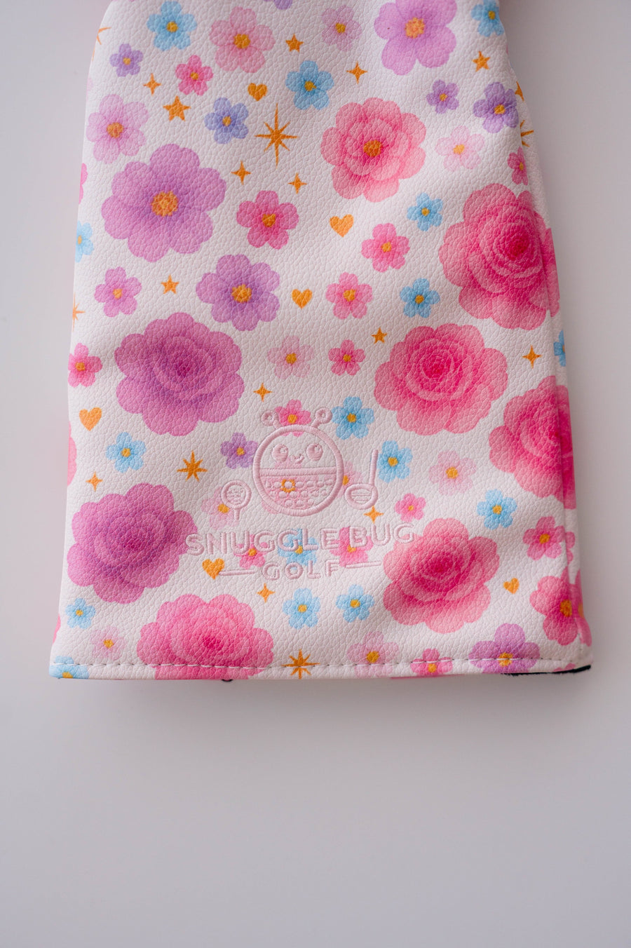 Snuggle Bug Golf Starlight Bloom driver head cover in white eco-leather with pink floral and golden star pattern.