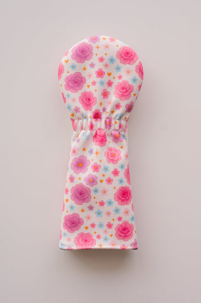 Snuggle Bug Golf Starlight Bloom fairway headcover in textured eco-leather with pink roses and golden stars pattern.