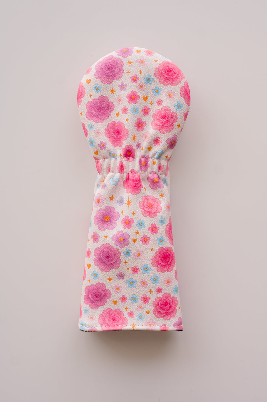 Snuggle Bug Golf Starlight Bloom fairway headcover in textured eco-leather with pink roses and golden stars pattern.