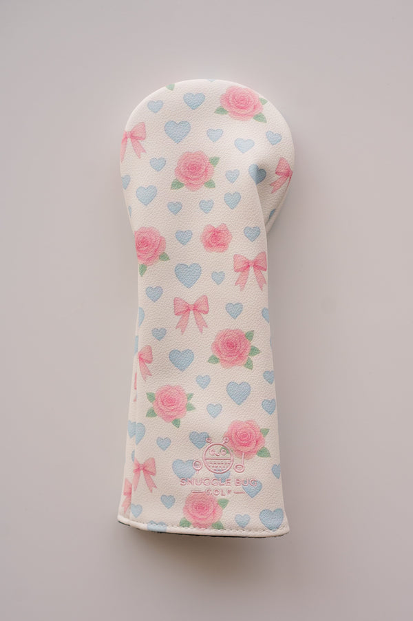 Snuggle Bug Golf fairway headcover in white eco-leather with pink roses, lavender hearts, and blush bow print.