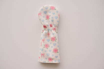Snuggle Bug Golf hybrid headcover in Sweetheart Rose print with pink roses, blue hearts, and blush bows on eco-leather.