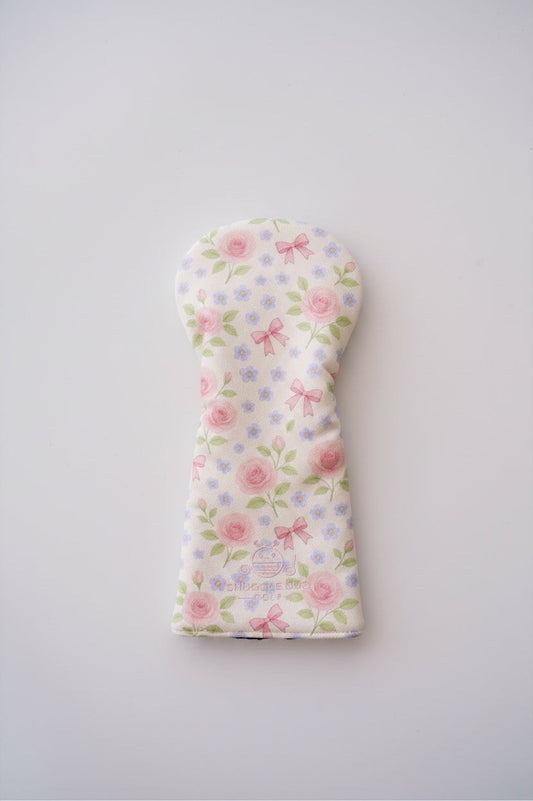 Snuggle Bug Golf Whisper Rose driver head cover in textured eco-leather with pink floral and bow print.