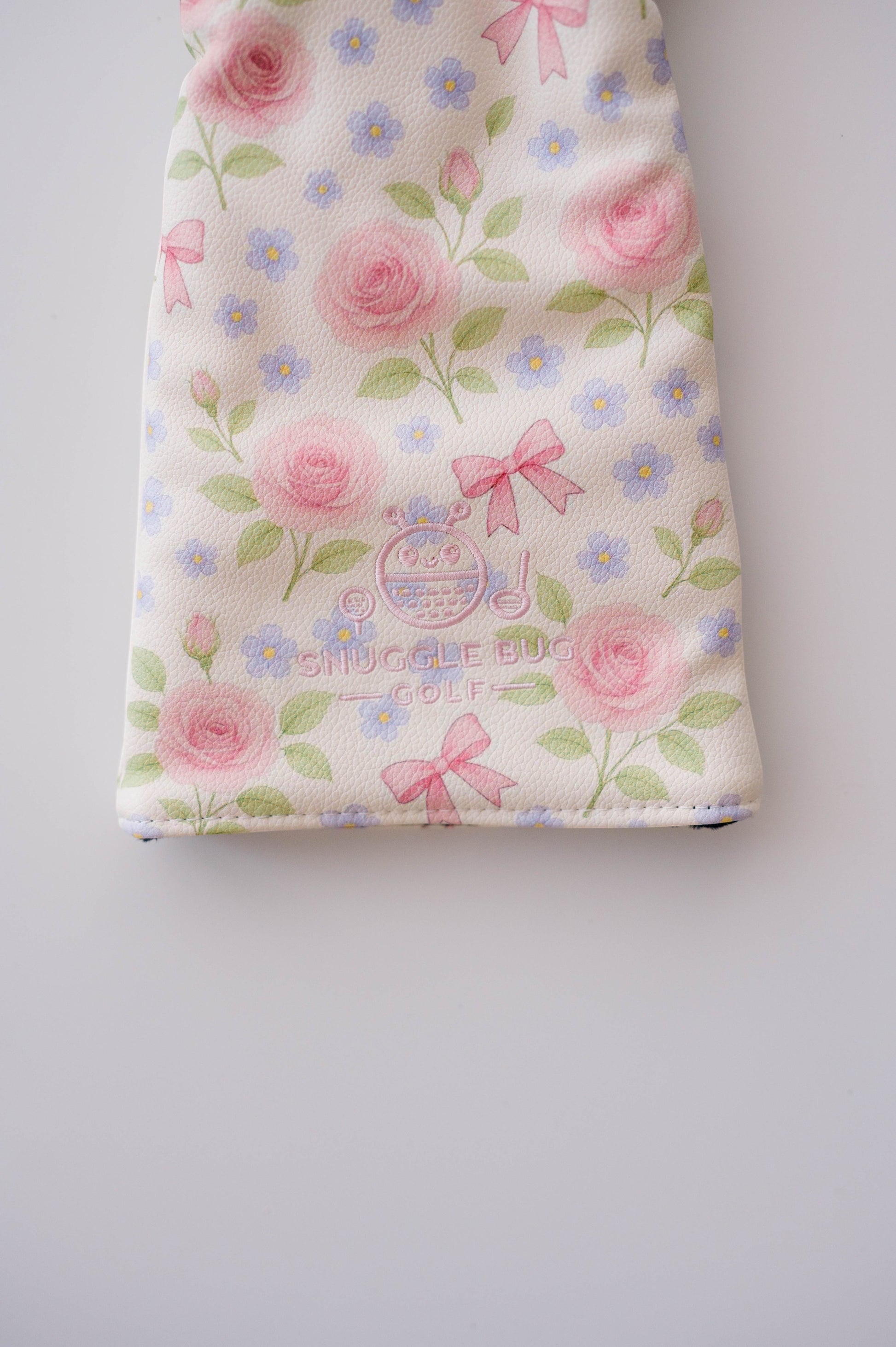 Snuggle Bug Golf Whisper Rose driver head cover in textured eco-leather with pink floral and bow print.