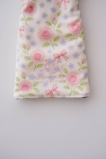 Snuggle Bug Golf Whisper Rose driver head cover in textured eco-leather with pink floral and bow print.