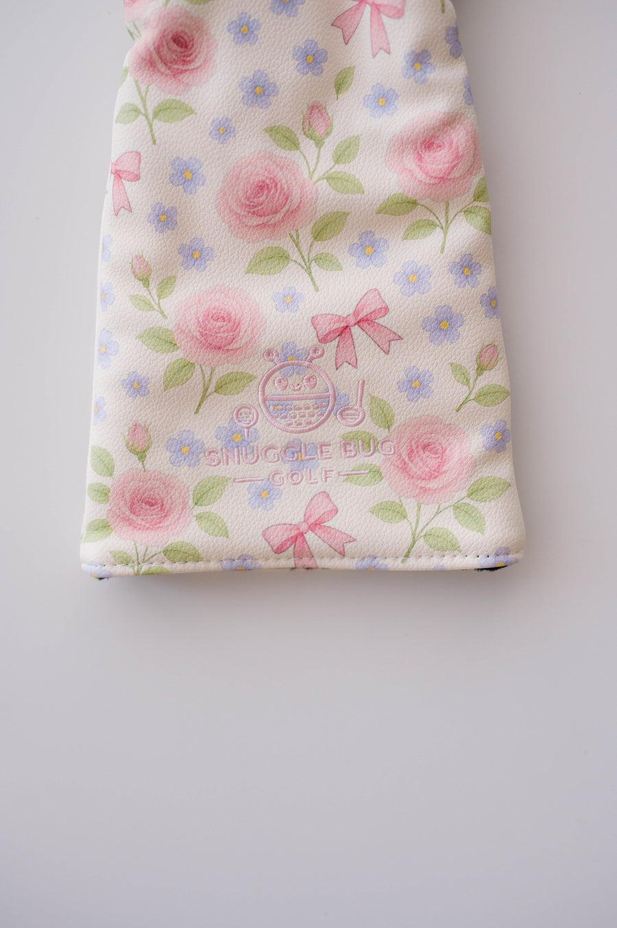 Snuggle Bug Golf Whisper Rose driver head cover in textured eco-leather with pink floral and bow print.