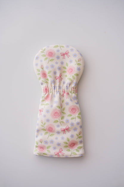 Snuggle Bug Golf Whisper Rose driver head cover in textured eco-leather with a vintage floral and pink bow print.