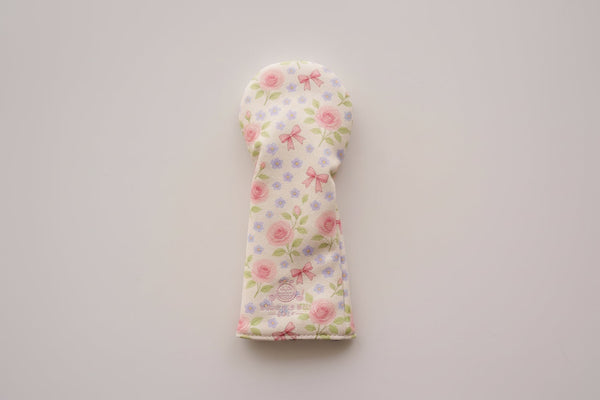 Snuggle Bug Golf Whisper Rose fairway headcover with floral print, pastel bows, and textured eco-leather finish.