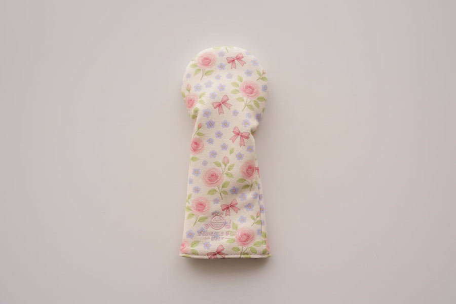 Snuggle Bug Golf Whisper Rose fairway headcover with floral print, pastel bows, and textured eco-leather finish.