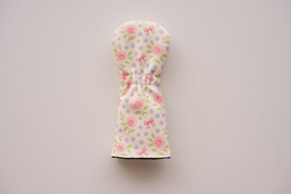 Snuggle Bug Golf Whisper Rose fairway headcover with floral print, pink bows, and textured eco-leather finish.