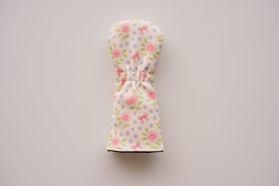 Snuggle Bug Golf Whisper Rose fairway headcover with floral print, pink bows, and textured eco-leather finish.