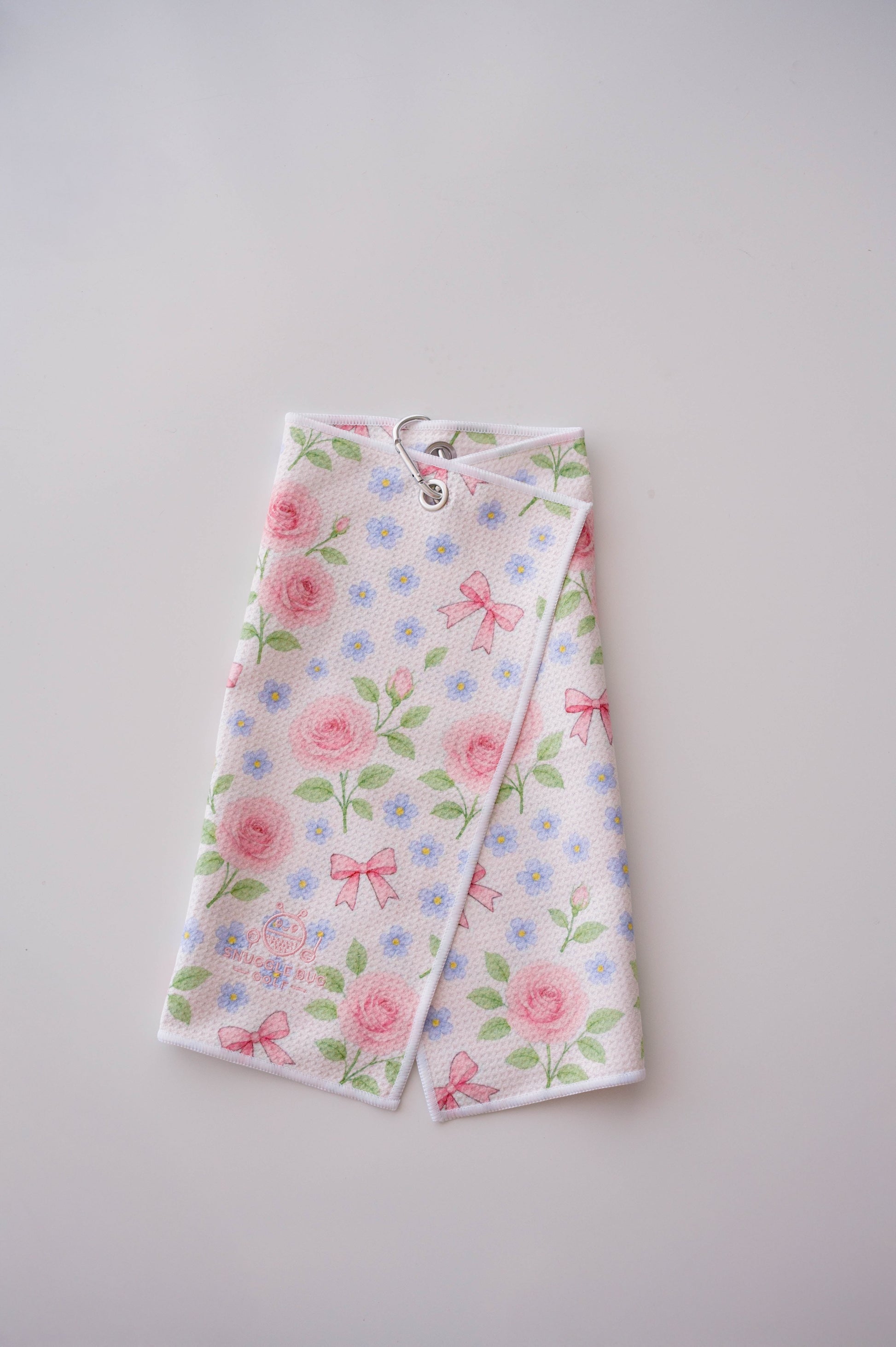 Snuggle Bug Golf Whisper Rose microfiber towel with pink roses, blue flowers, and bows, featuring a silver hook.